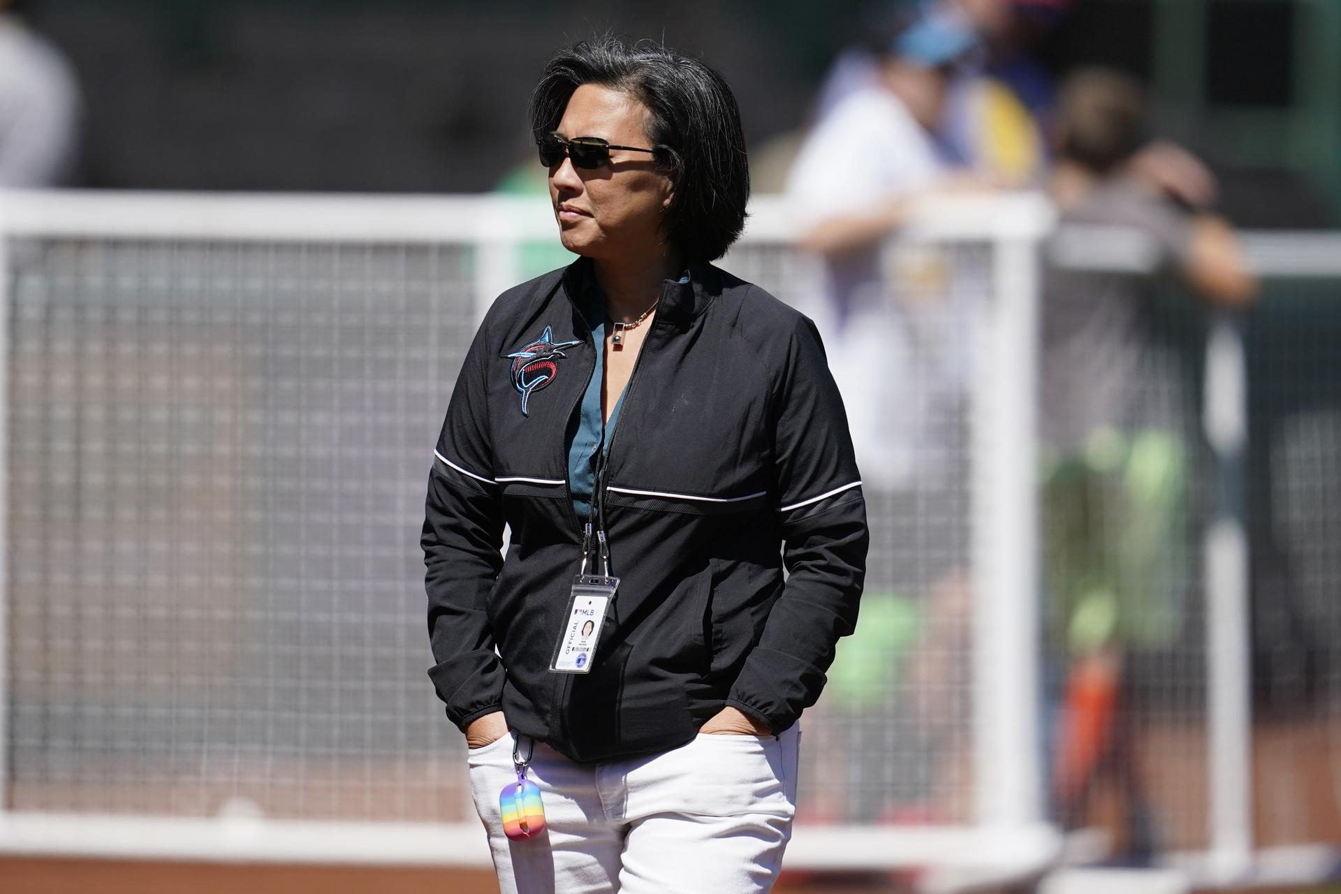 Marlins general manager Kim Ng stands on the field