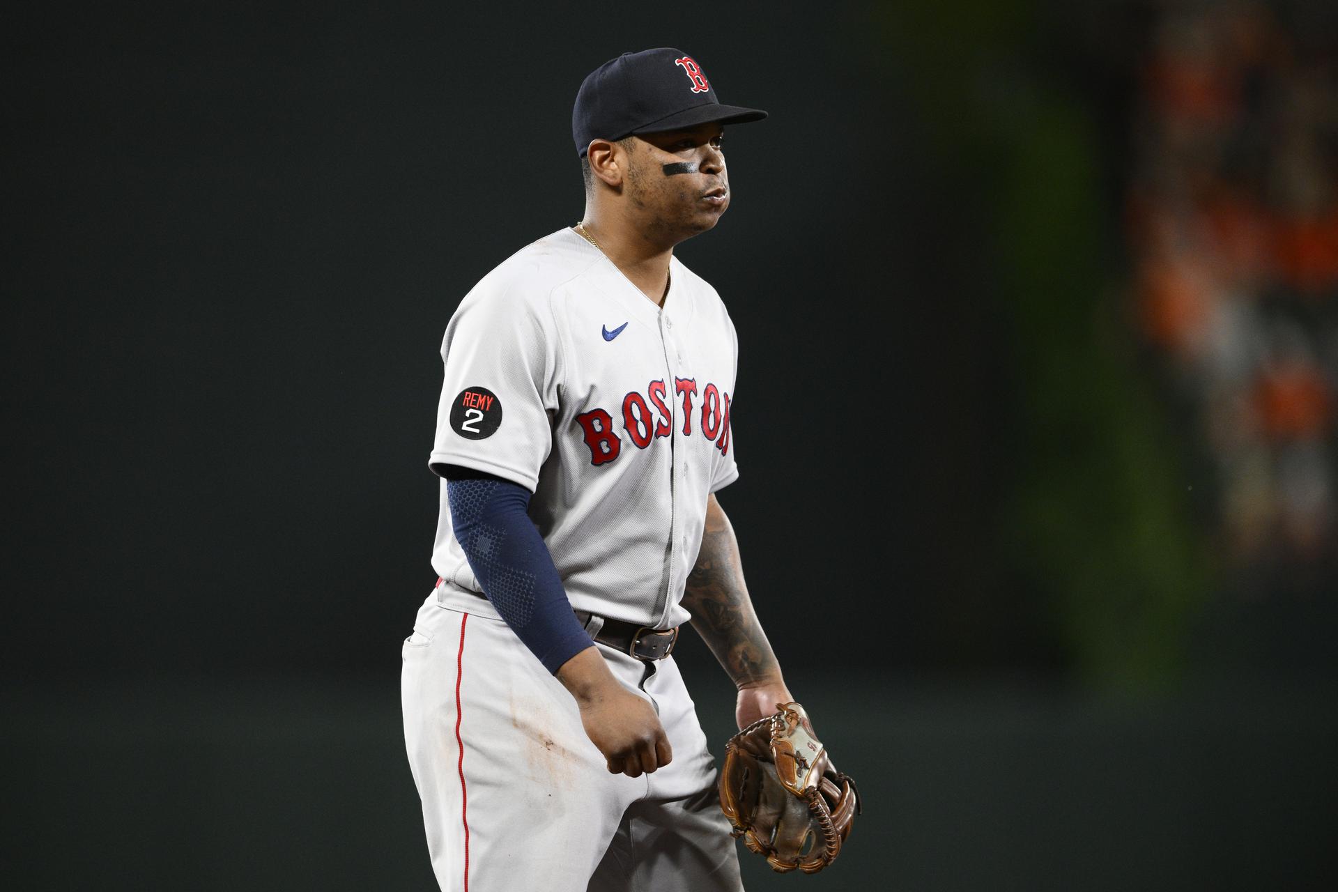 Red Sox third baseman Rafael Devers stands ready on the field