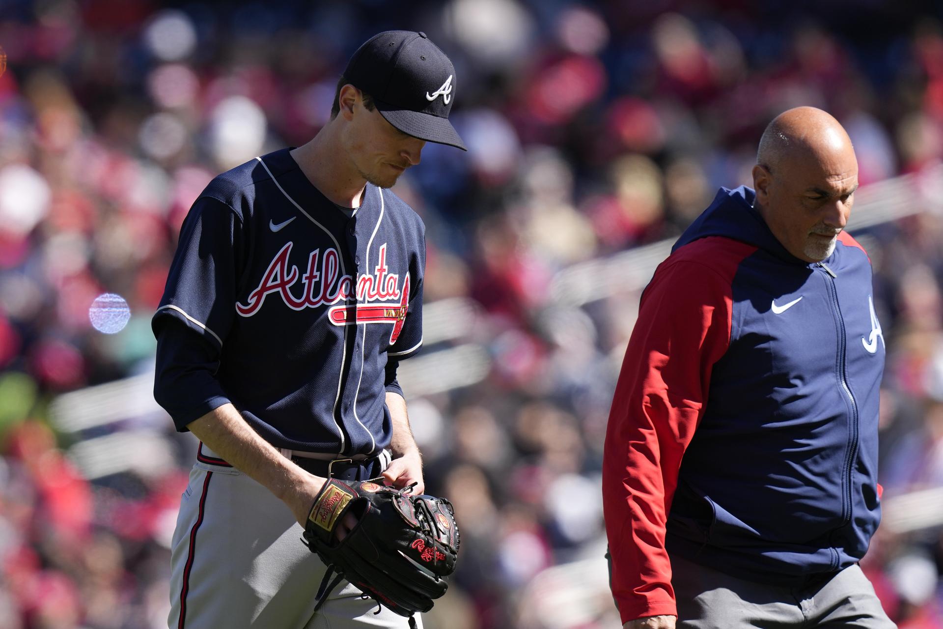 Max Fried exits with a trainer