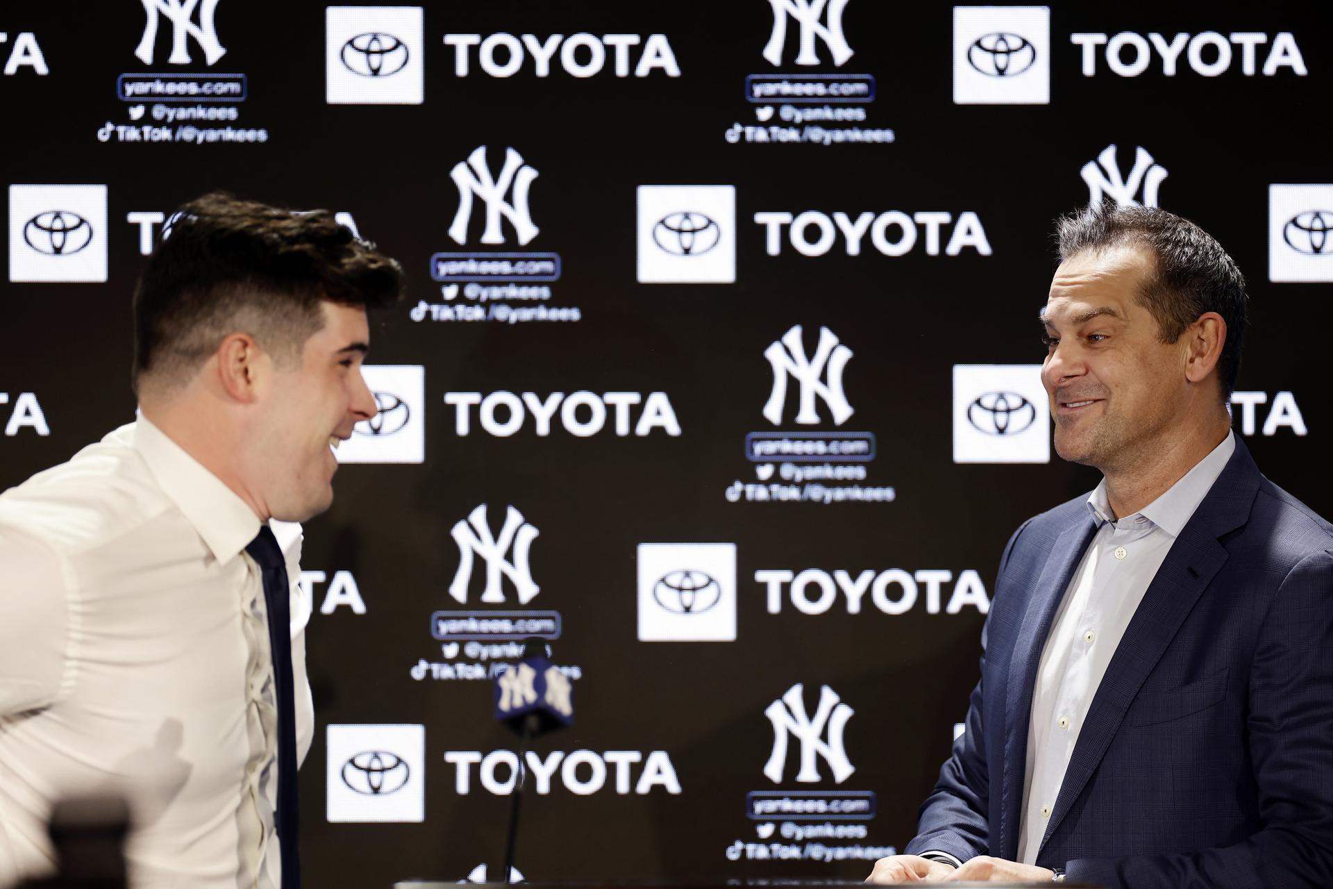 Carlos Rodón and Yankees manager Aaron Boone