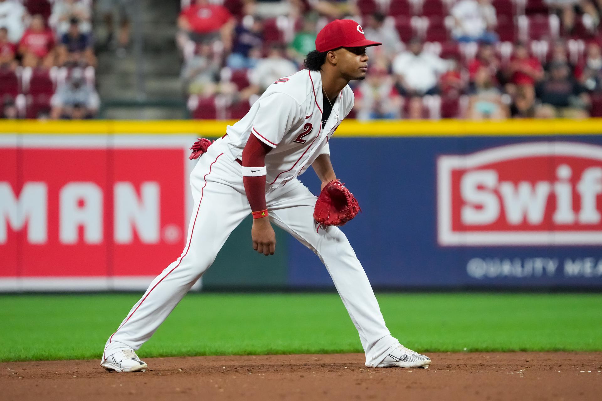 Reds player Jose Barrero stands ready while playing shortstop during a baseball game