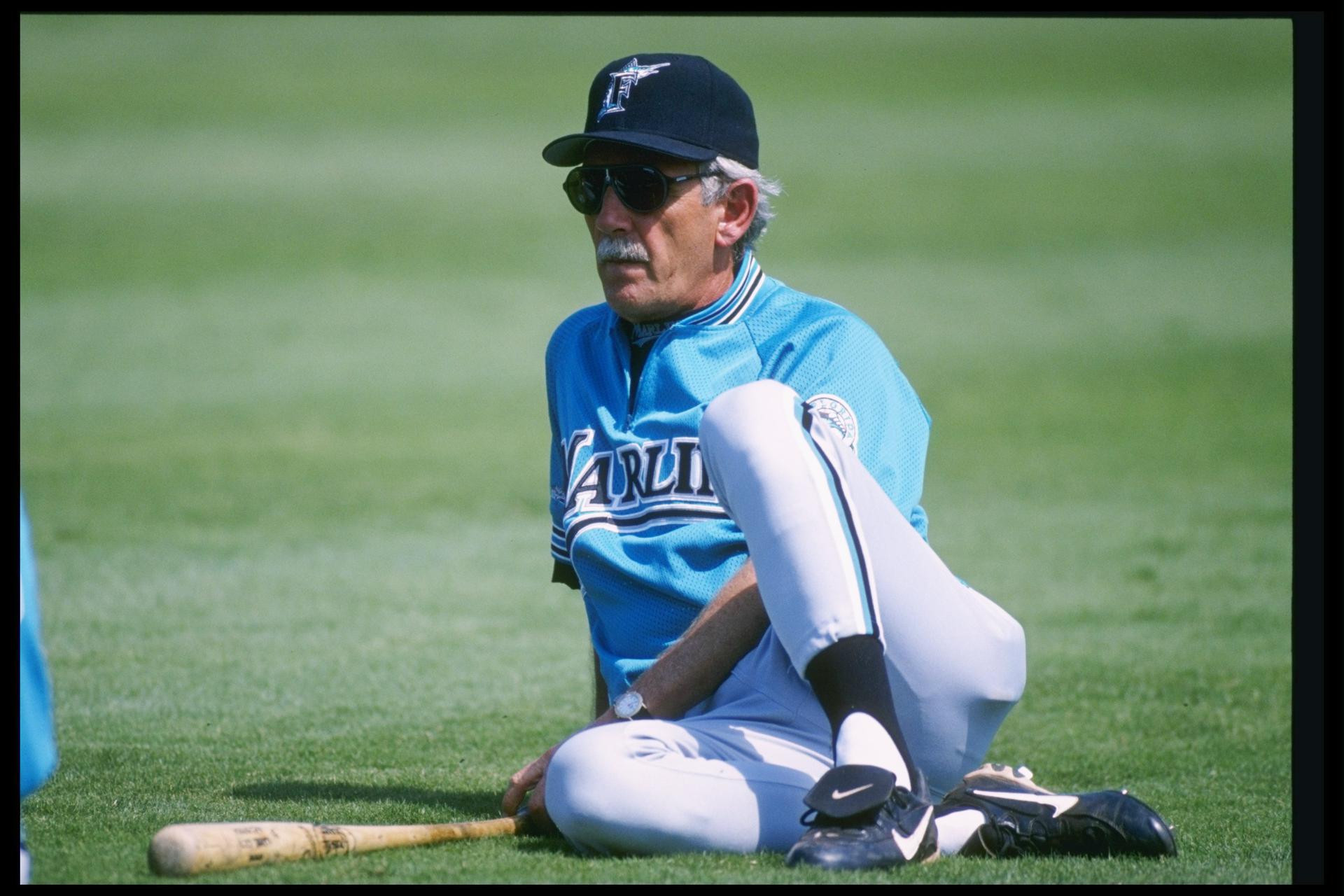 Former Marlins manager Jim Leyland sits on the baseball field