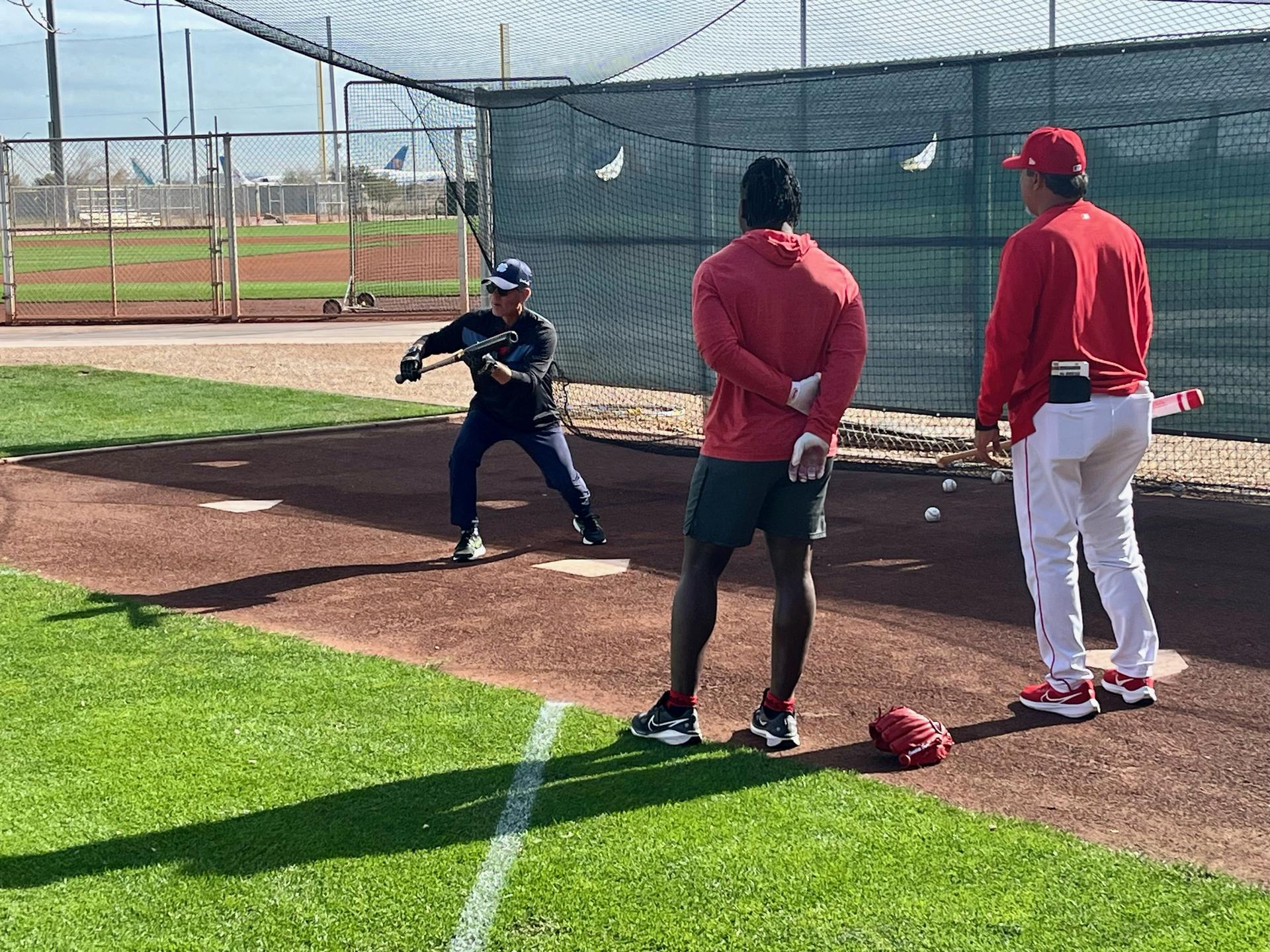 Brett Butler coaching Reds players on bunting