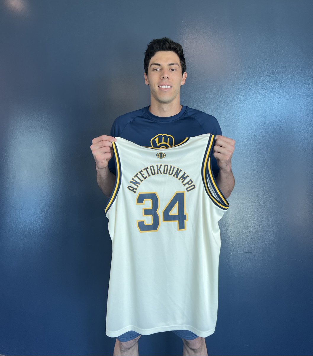 Christian Yelich with a Brewers Giannis basketball jersey