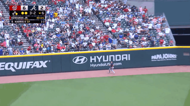 GIF of Nationals outfielder Alex Call making a catch at the wall