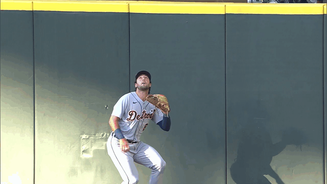 A gif of Tigers outfielder Matt Vierling leaping to make a home run robbery