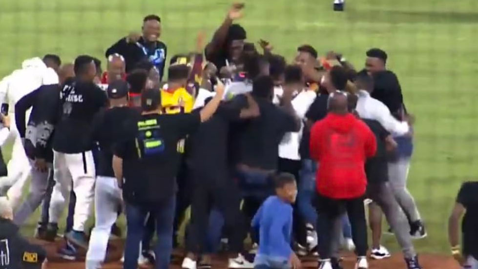 A celebration on the field after Ronald Acuña Jr. wins a HR derby in Venezuela