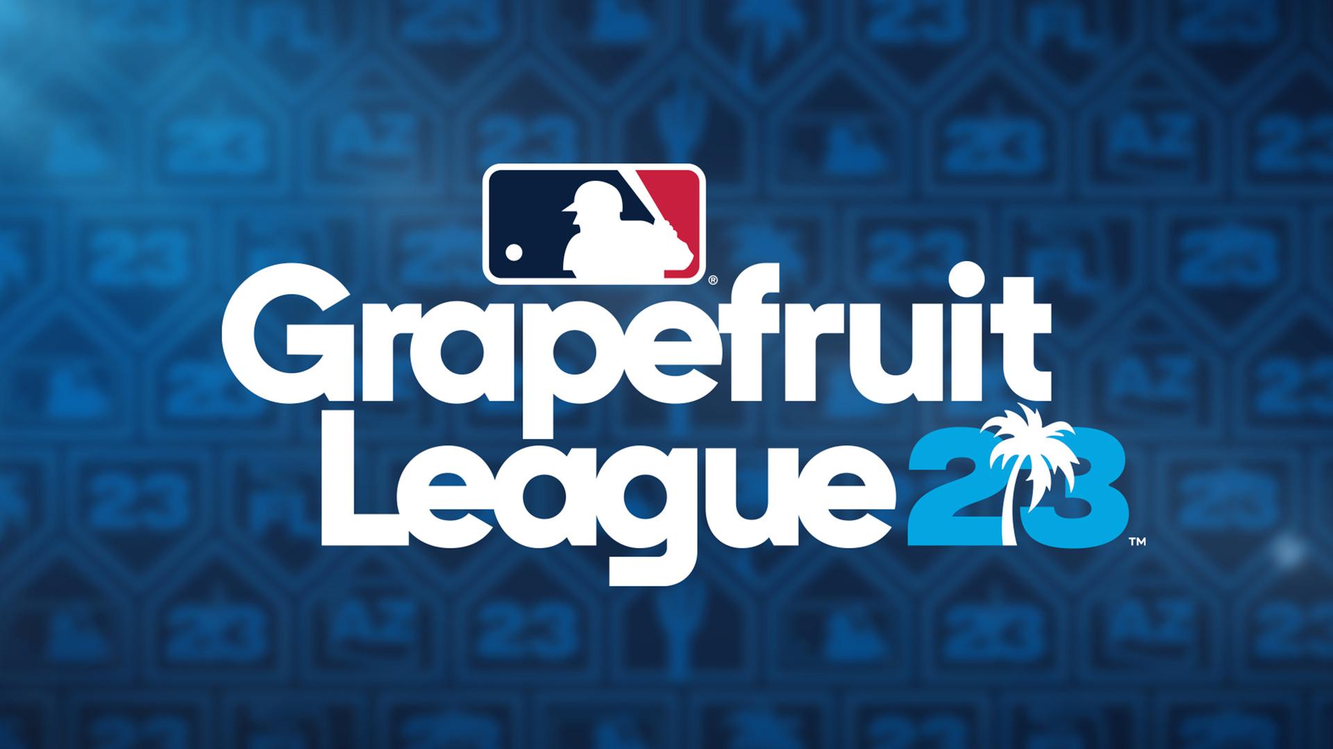 The MLB logo over the words ''Grapefruit League 23'' on a blue background