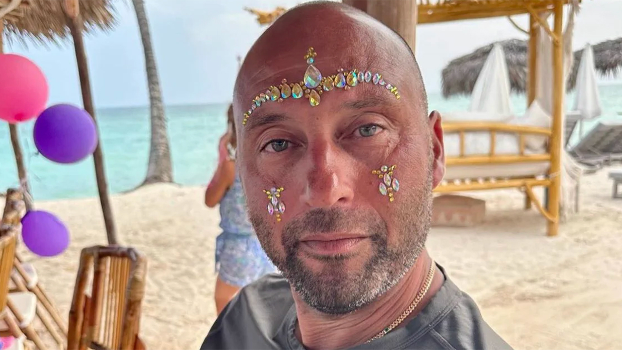 Derek Jeter's face is adorned with decorations