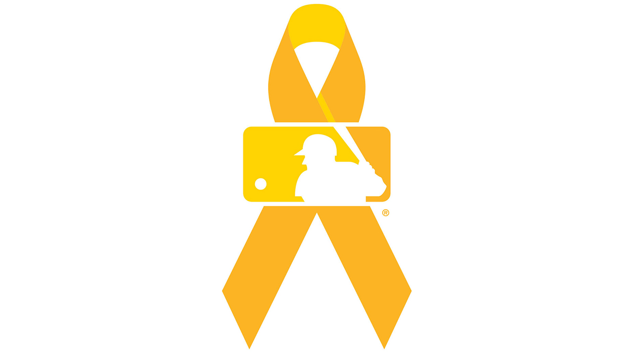 An image of a yellow ribbon associated with childhood cancer featuring the MLB logo