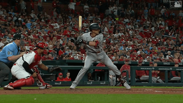 An animated gif of Nick Ahmed hitting a ball off a bounce