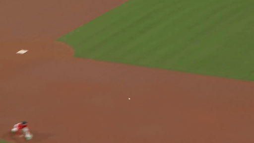 An animated gif of a shortstop making a diving stop