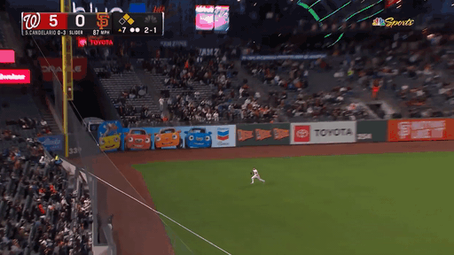 An animated gif of Mitch Haniger making a diving play