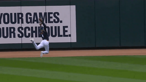 An animated gif of Nick Gordon making a leaping, lunging catch