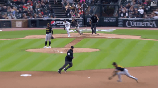 An animated gif of a shortstop making a diving play