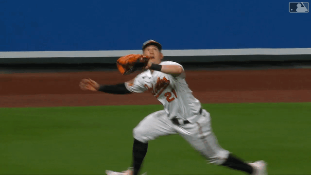 An animated gif of Austin Hays making a diving catch