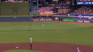 An animated gif of Kyle Isbel making a diving catch