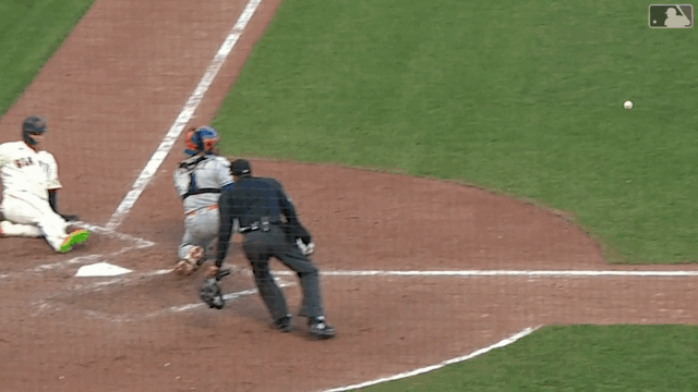 An animated gif of Joc Pederson sliding into home plate