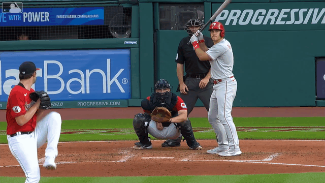 An animated gif of J.T. Realmuto catching a pitch while at bat