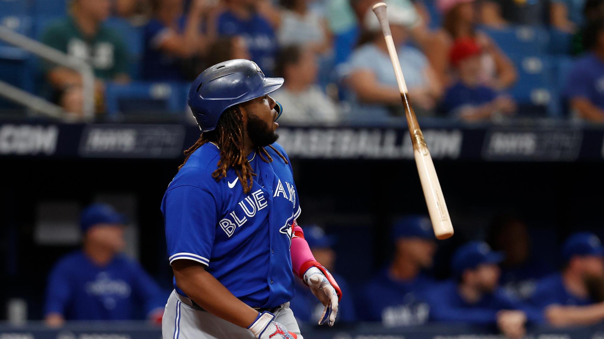 Vladimir Guerrero Jr. flips his bat after hitting a home run