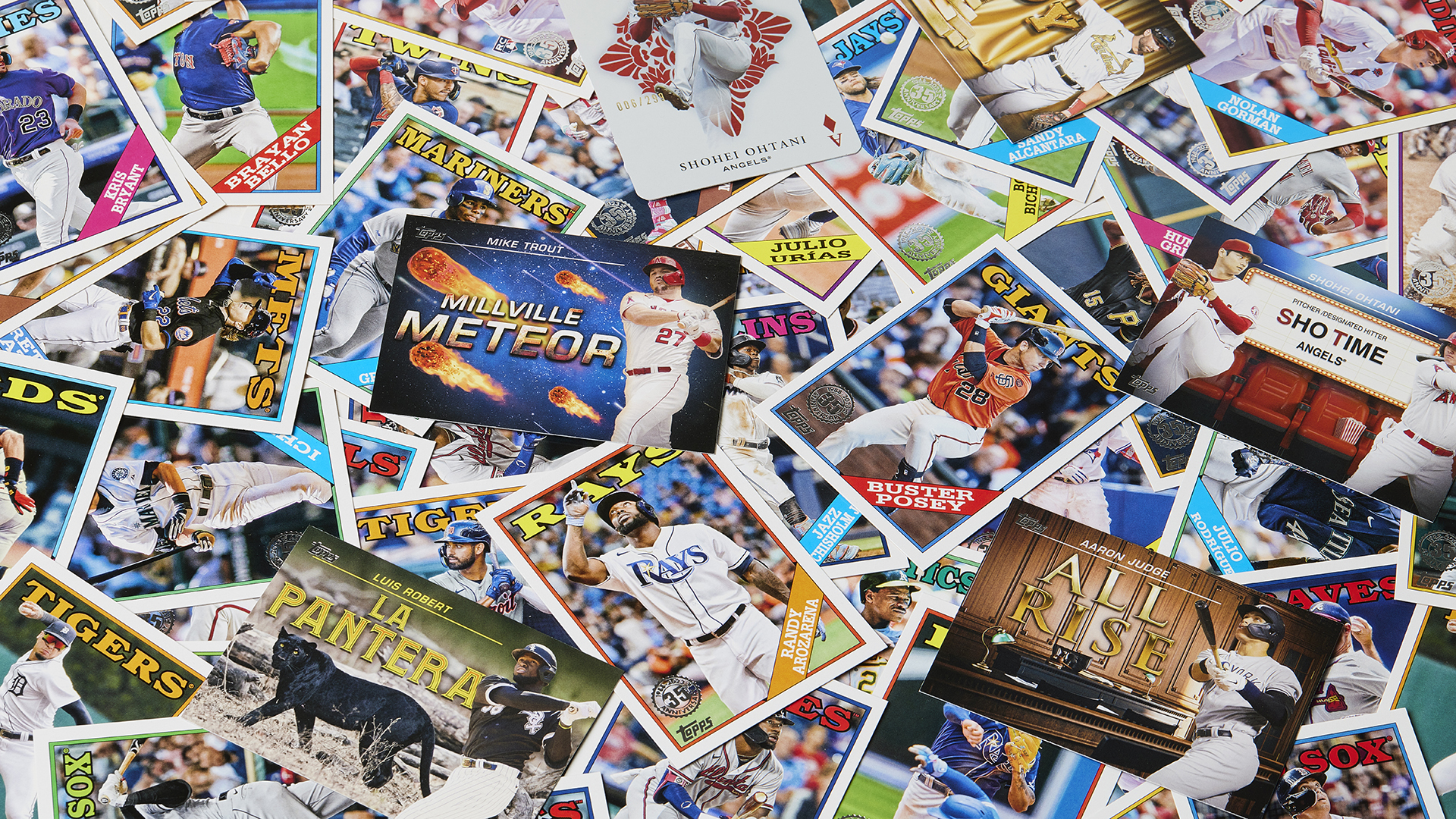 A scattered pile of 2023 Topps baseball cards