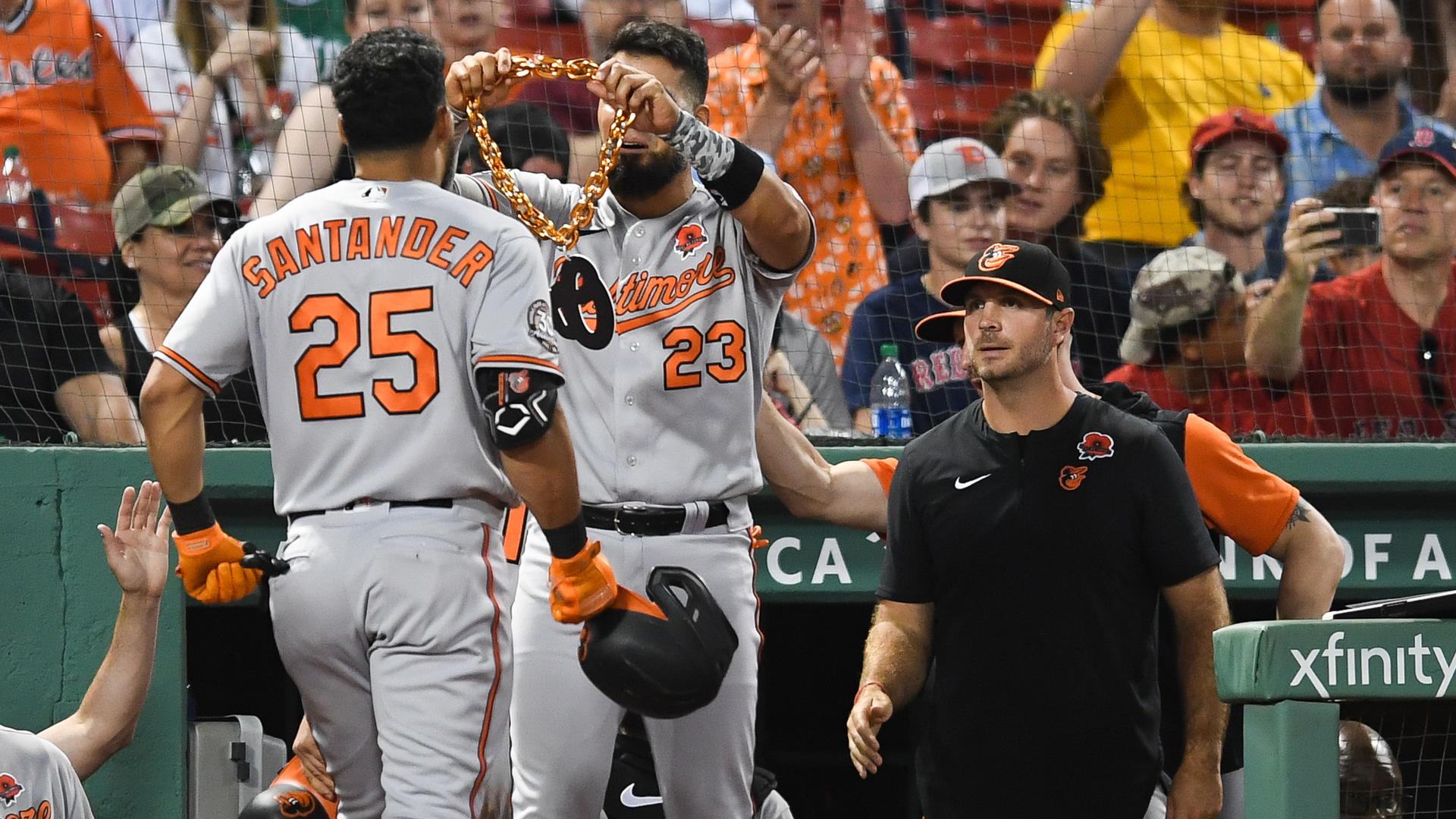 Orioles players celebrate after a home run