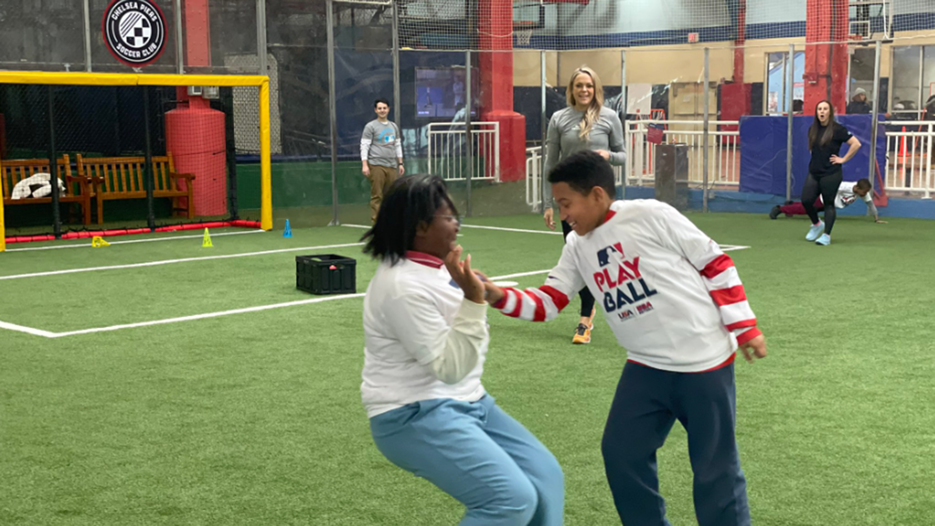 Jennie Finch mentoring young kids at Chelsea Piers