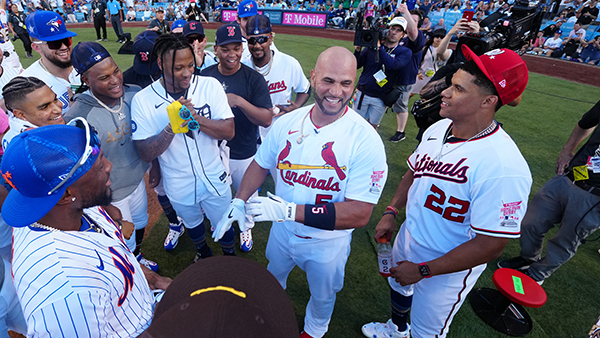 Albert Pujols surrounded by All-Stars at the 2022 Home Run Derby
