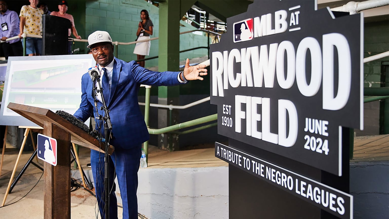 Harold Reynolds reveals the logo for MLB at Rickwood Field