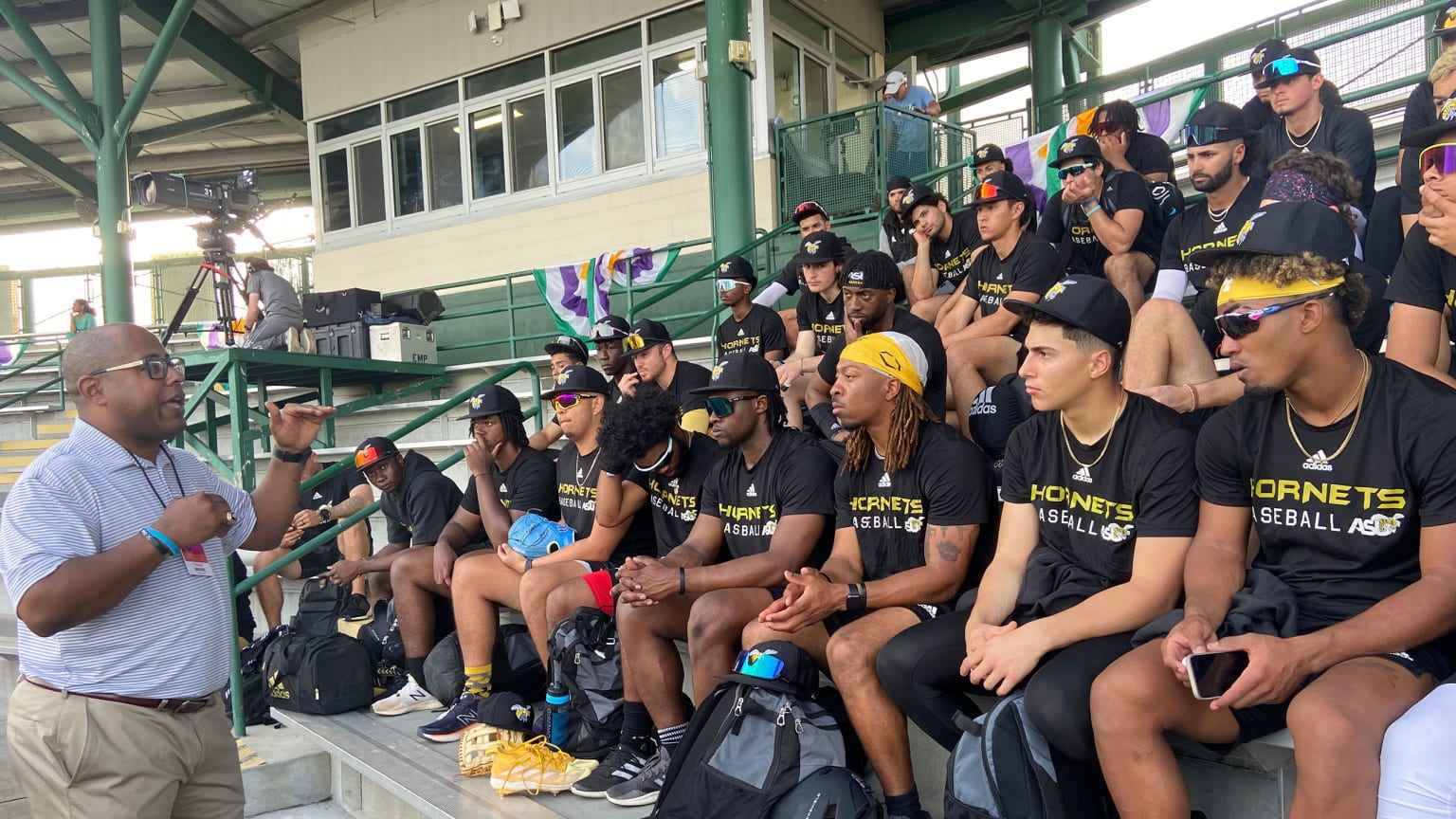 Major League Baseball's senior director of front office and field staff diversity pipeline program Tyrone Brooks speaks to young players